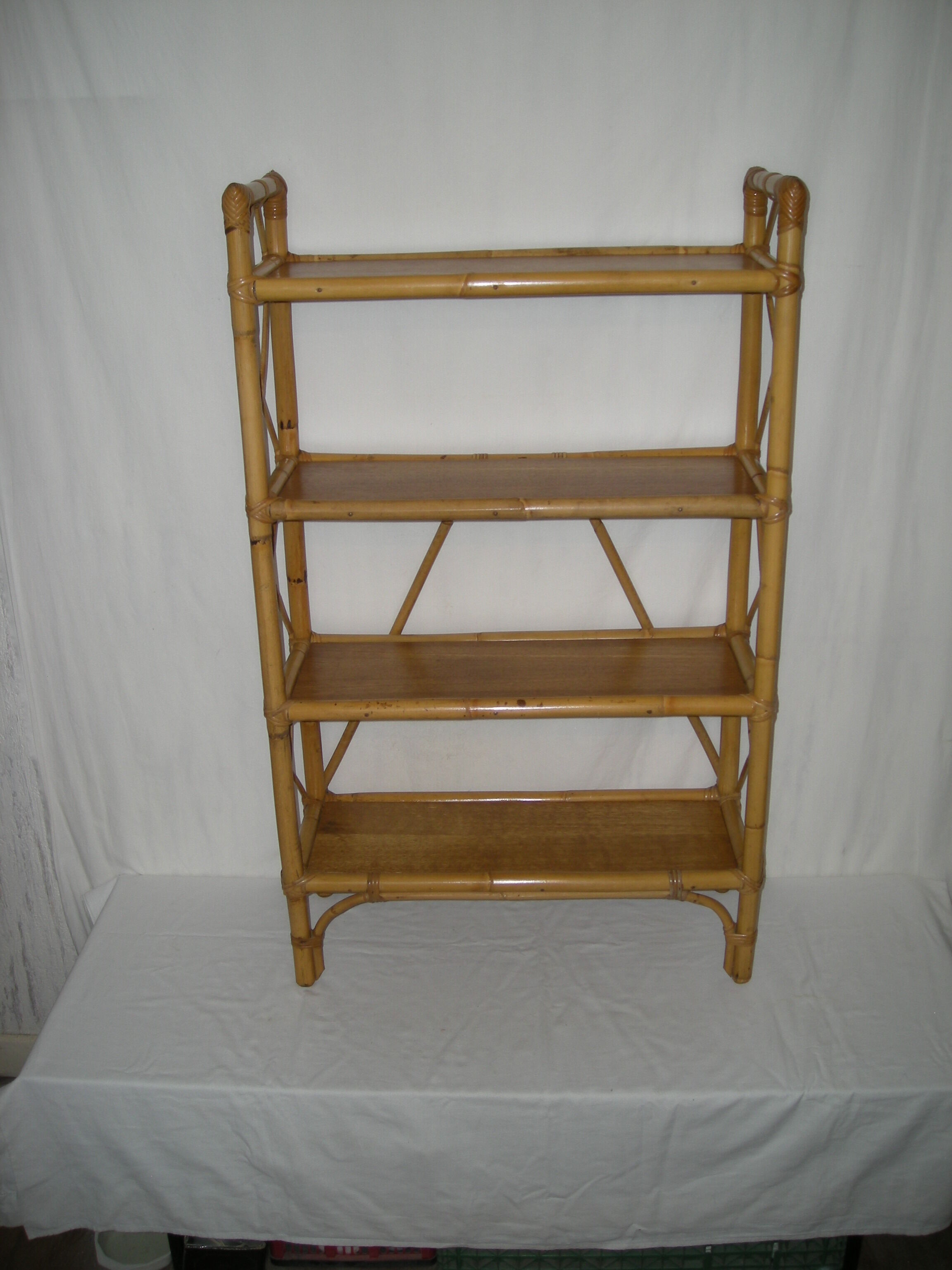 Rattan bamboo shelf on feet from the 50s 60s