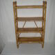 Rattan bamboo shelf on feet from the 50s 60s