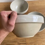 Trio of beige enamelled sandstone bowls