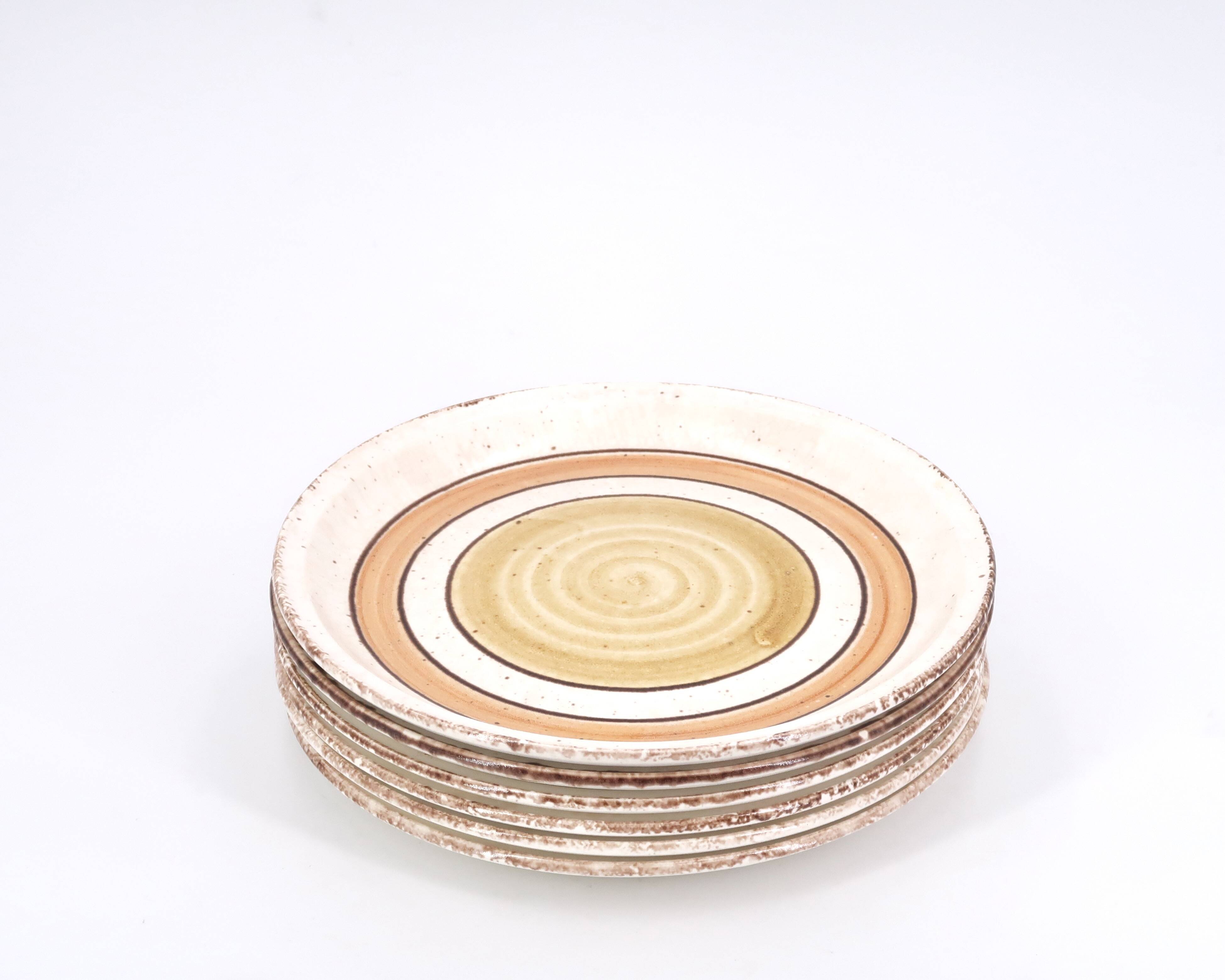 Six Gien earthenware plates, Etna model, 1970s