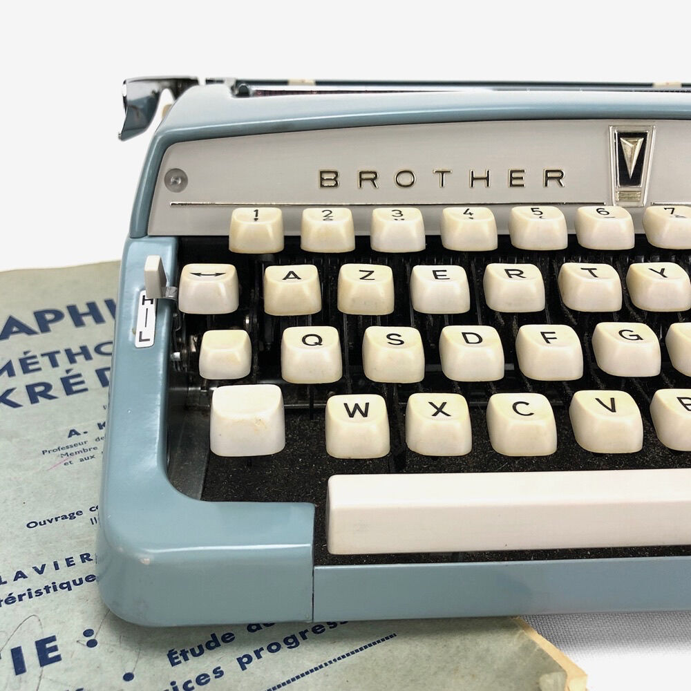 Brother Deluxe typewriter of the 60s and his briefcase