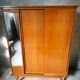 Vintage Scandinavian wardrobe, tapered legs, sliding door.