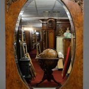 Mirror from the Napoleonic III era, second half of the 19th century in burl and bronze.