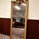 Antique English golden barock mirror mirror with large ornament