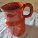 Pitcher vase in orange stoneware