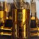 Brass pendant lamp and five-faceted vintage smoked glasses