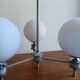 White ball and metal chandelier