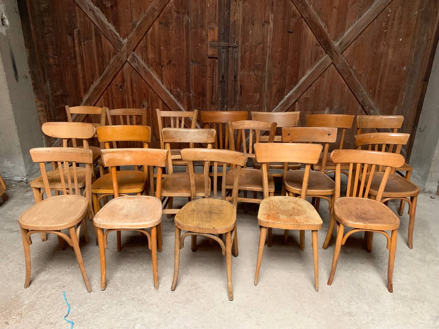 Series of 20 vintage mismatched bentwood bistro chairs
