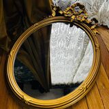 Miroir ancien ovale a fronton noeud