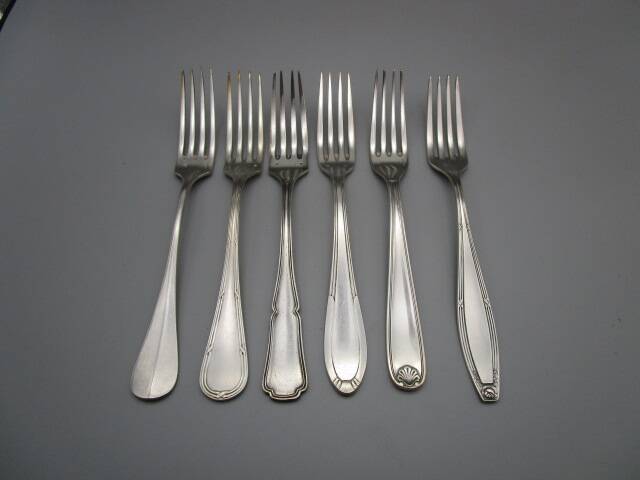 6 mismatched old silver metal forks for a chic table