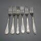 6 mismatched old silver metal forks for a chic table