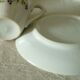 Coffee cups in porcelain decorated with a barb.