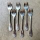6 Christofle silver-plated oyster forks, shell design.