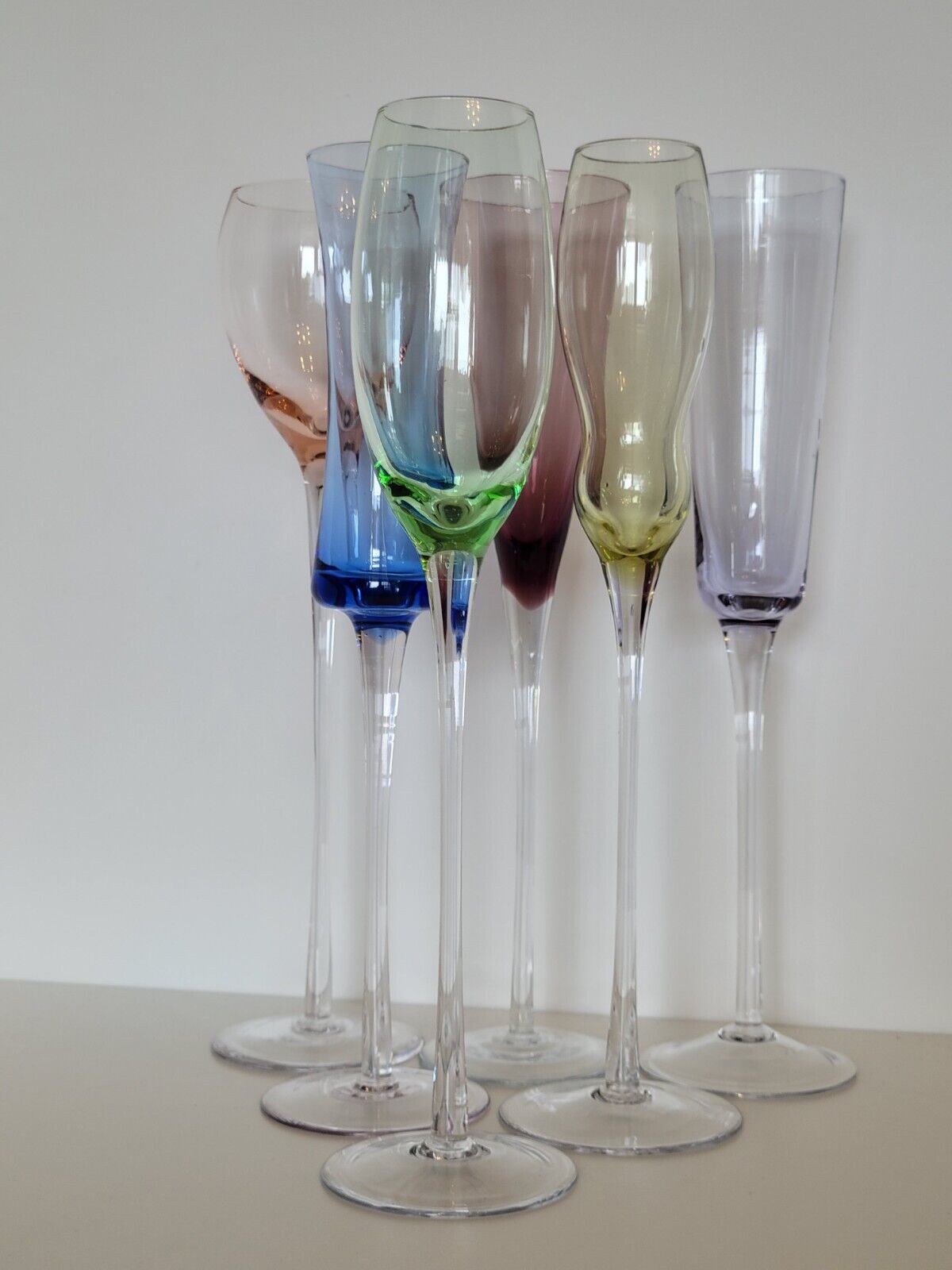 Set of 6 champagne flutes in different colors and shapes