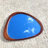 Contemporary oval mirror in teak finish