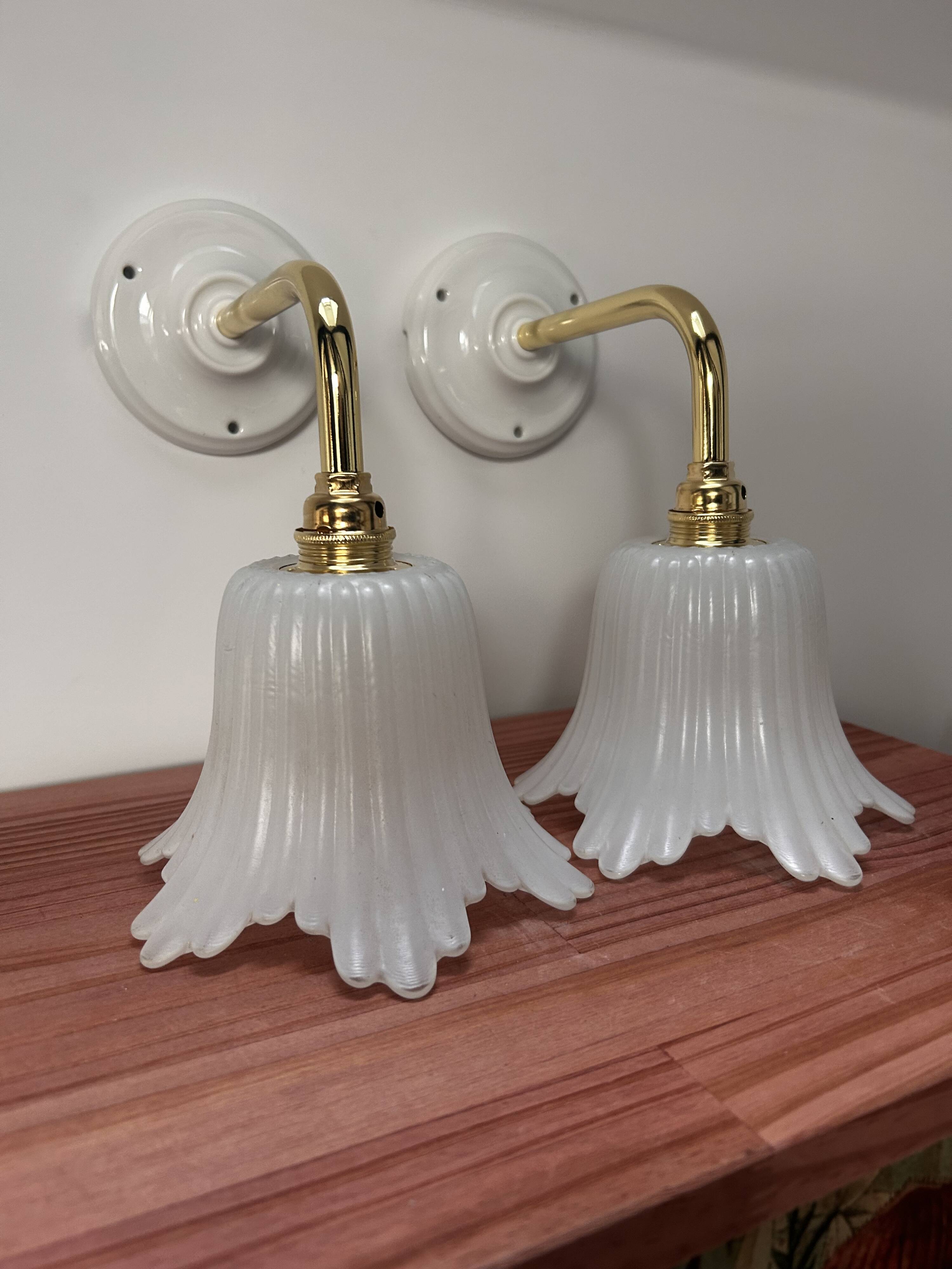 Pair of white tulip wall sconces
