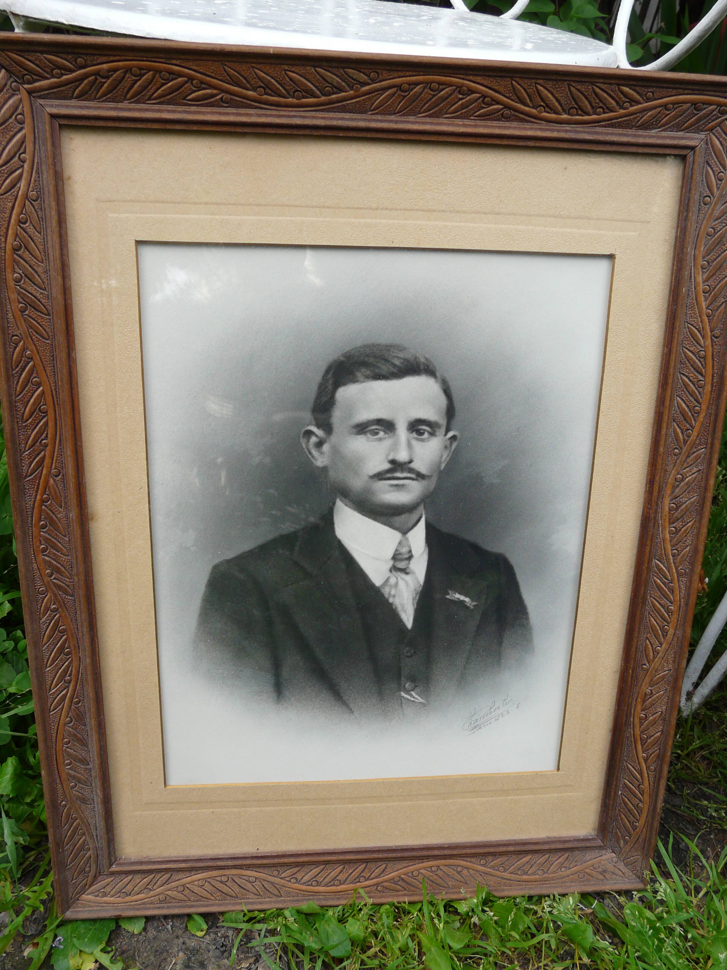 Pair of wooden frames with signed photos, 1923