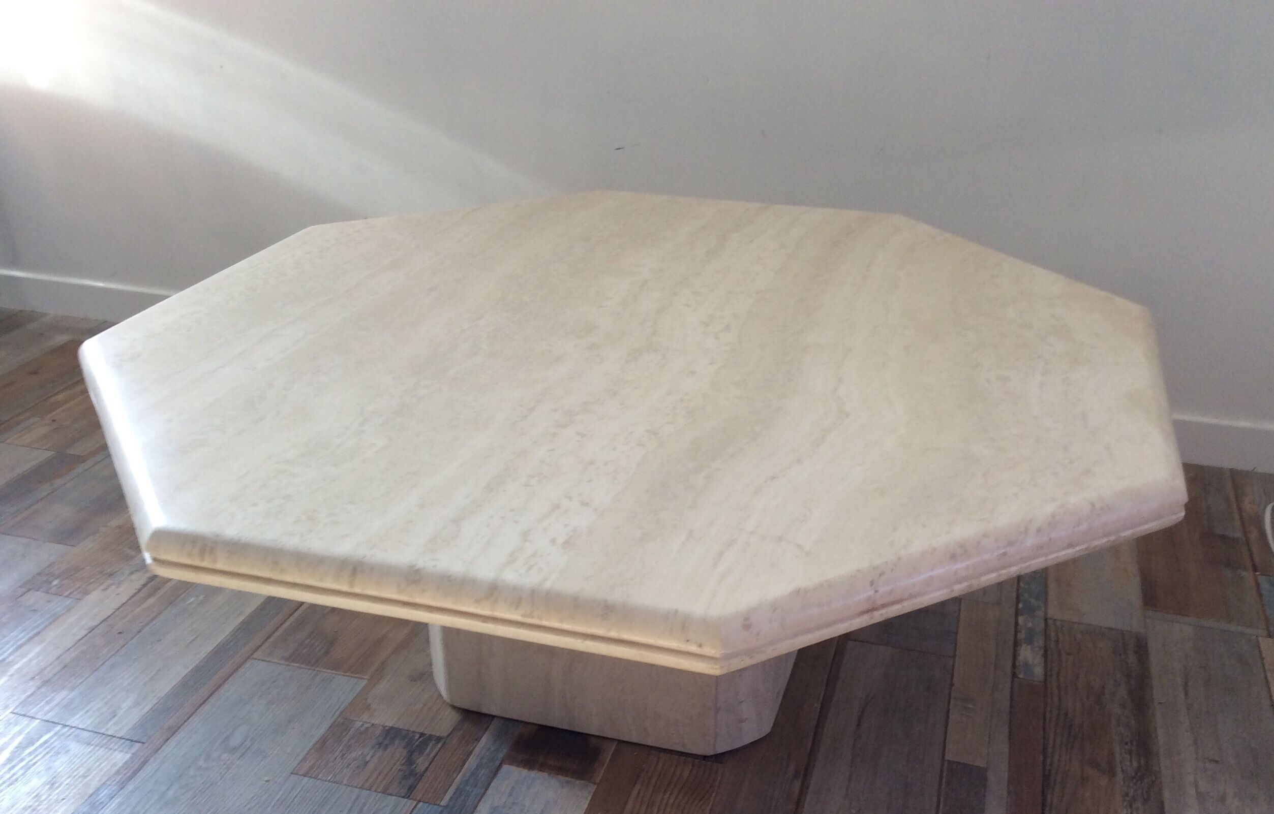 Octagonal coffee table in travertine