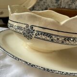 Sauceboat on a wrought iron base from Salins.