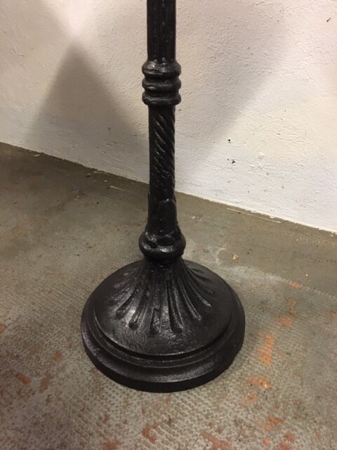 Old foot cast-iron bistro and brass round tray