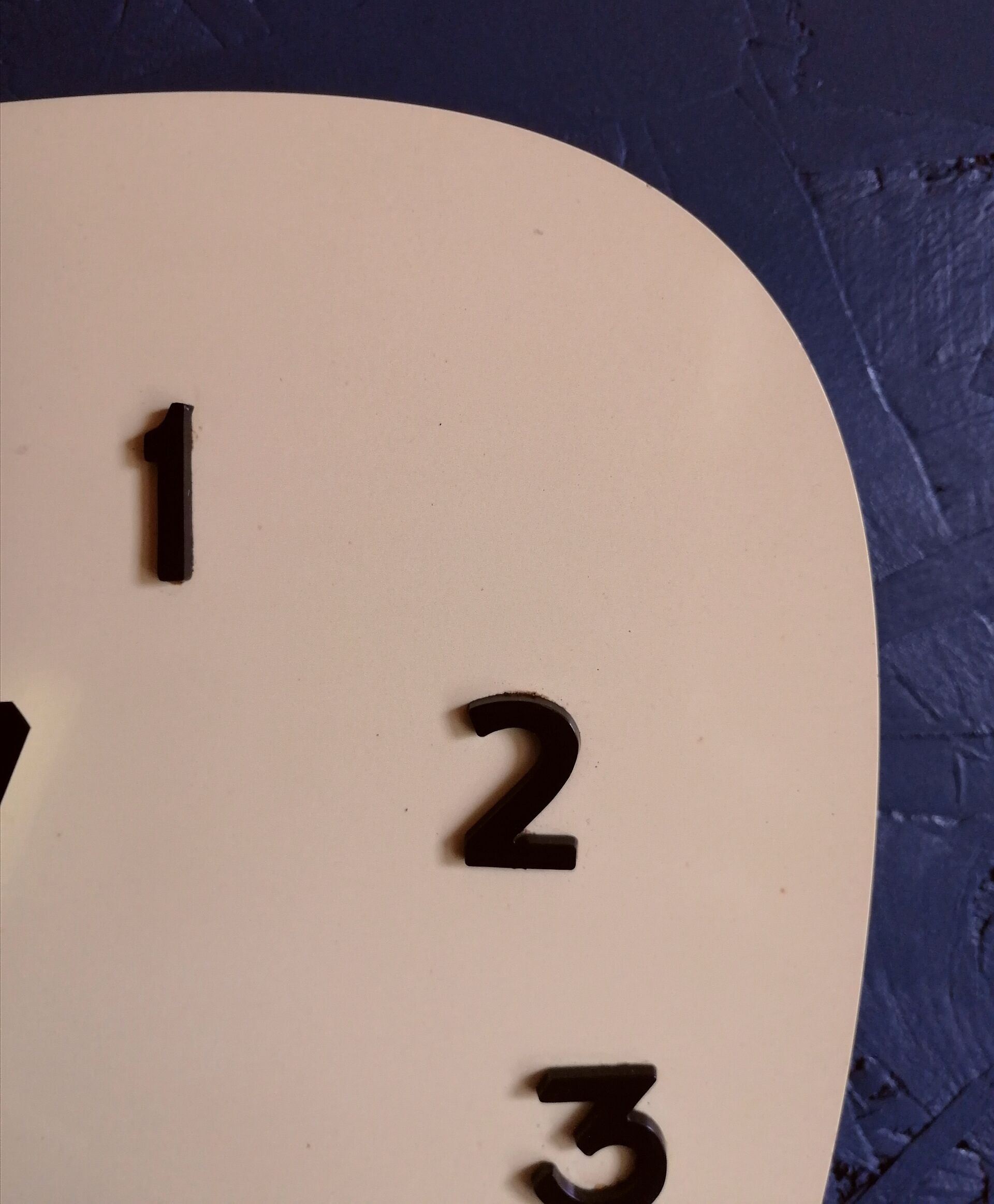 Clock formica vintage asymmetrical silent wall clock "Manufrance pale yellow"