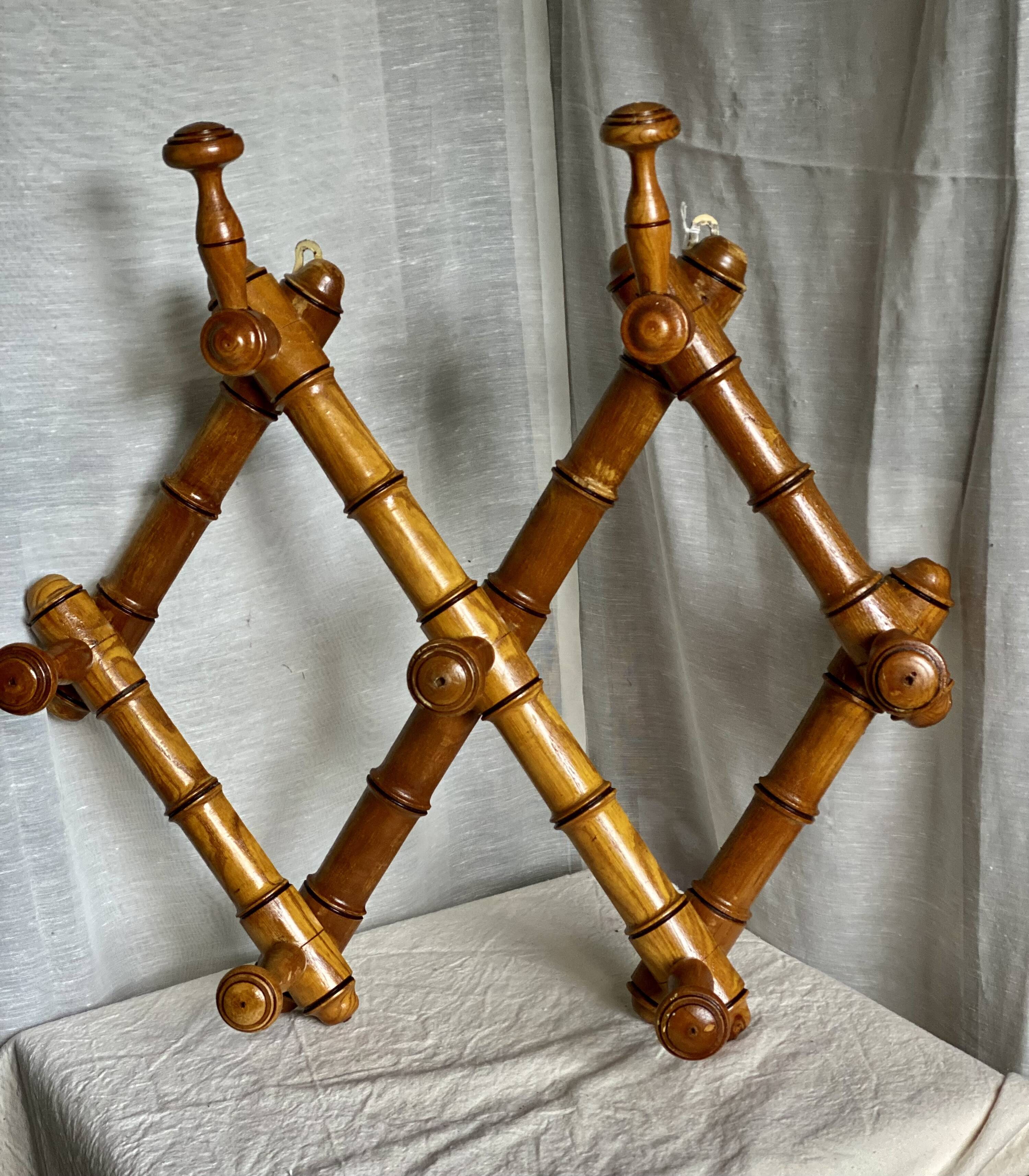 19th century turned wood accordion coat rack.