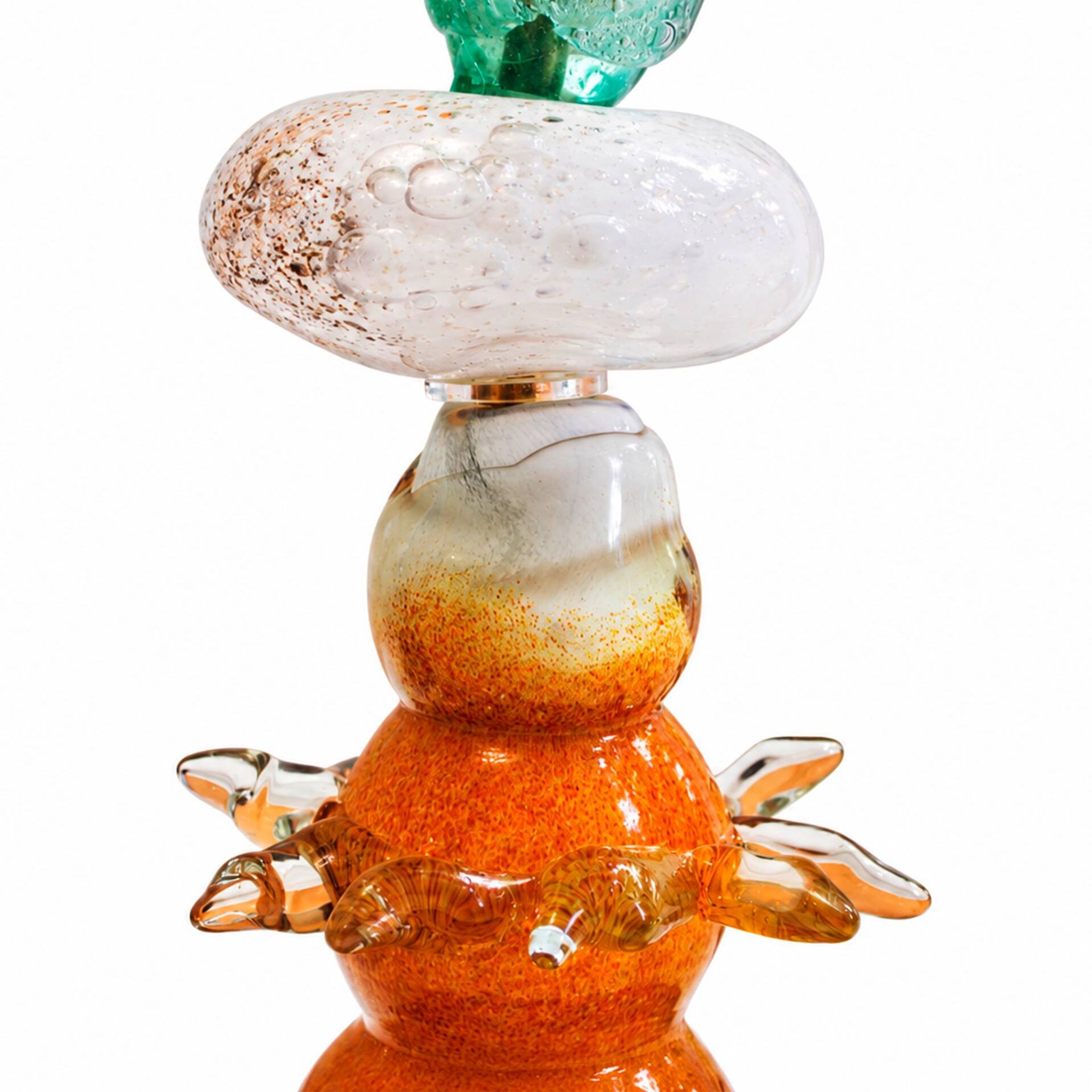 Set of three sculptural multicoloured glass floor lamps in a modernist style.