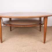 Round coffee table, two levels, danish in teak, brass and cannage