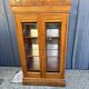 Two-door mahogany display cabinet