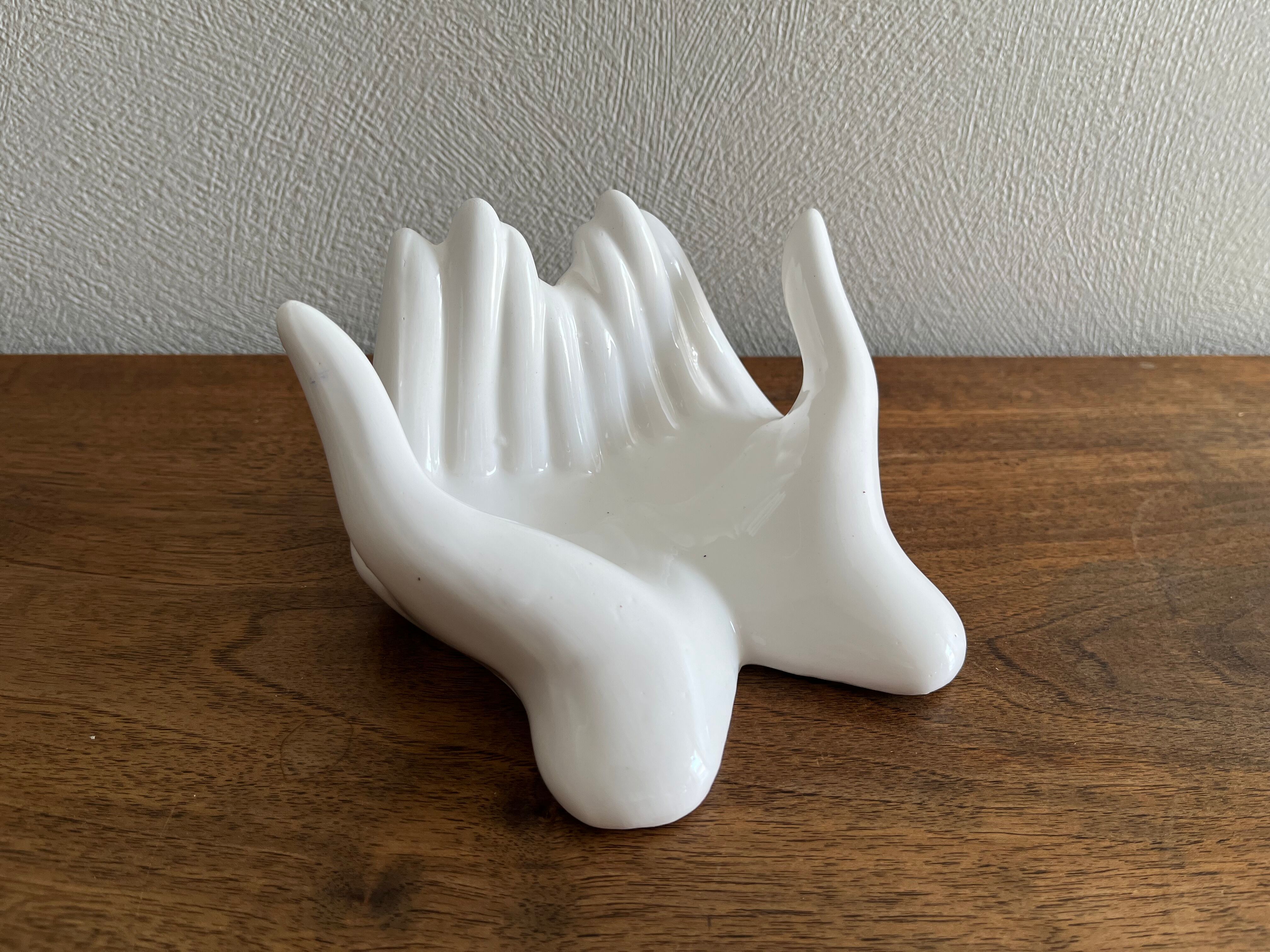 Empty white ceramic hand pocket