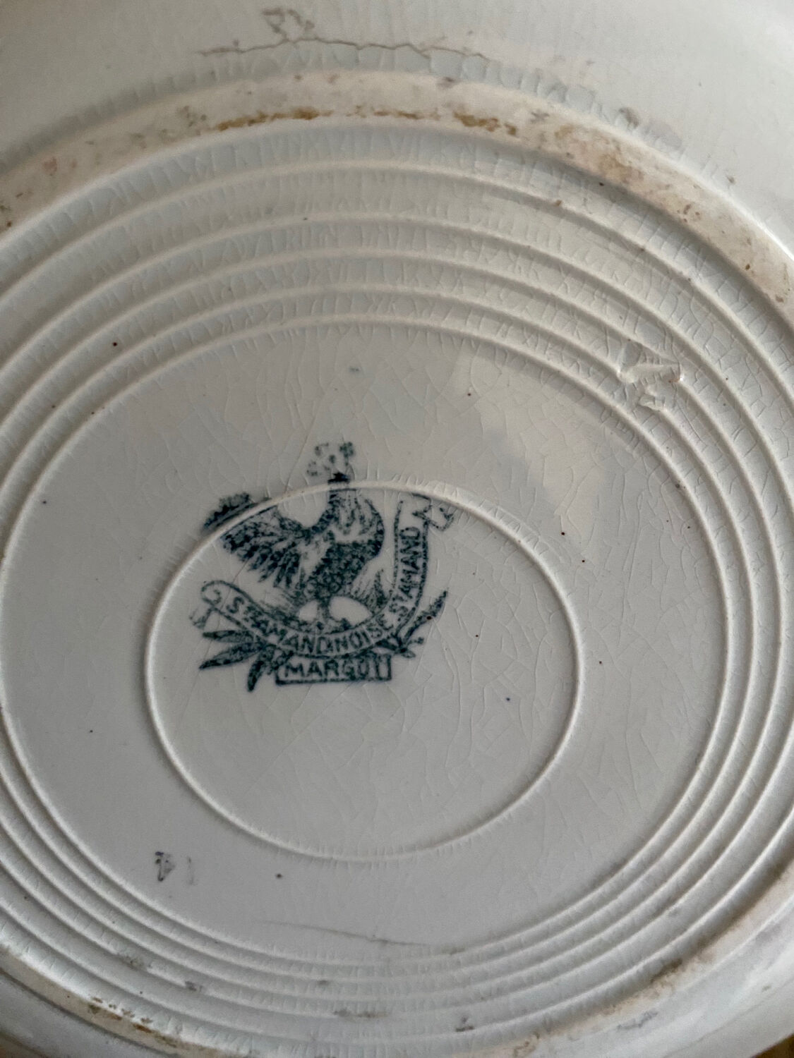 3 mismatched iron earth flat plates in green.