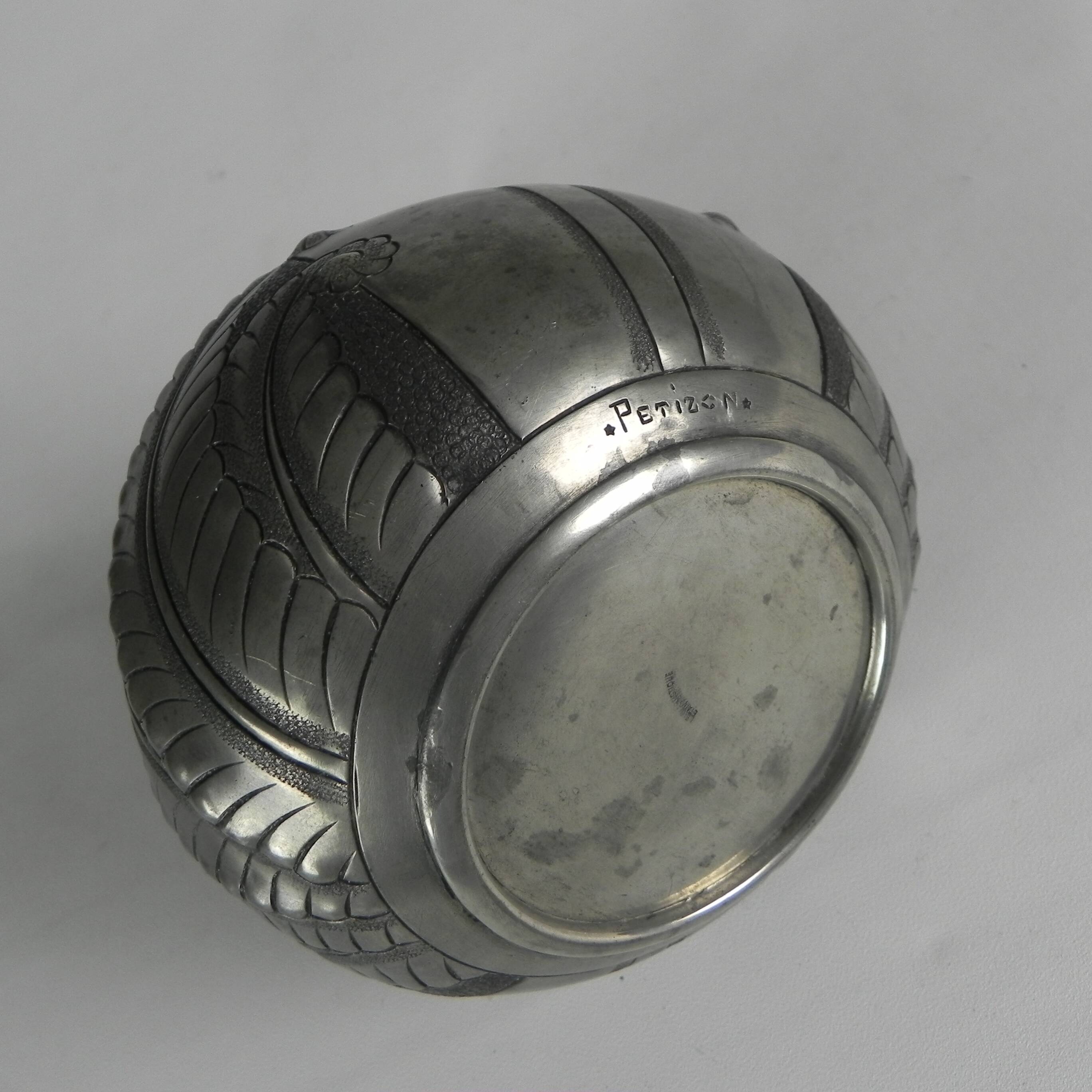 Art Nouveau pewter vase, signed PETIZON, early 20th century.