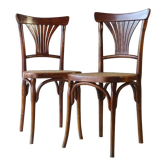 Deux chaises bistrot Kohn n°196 à palmette, vers 1906, cannées