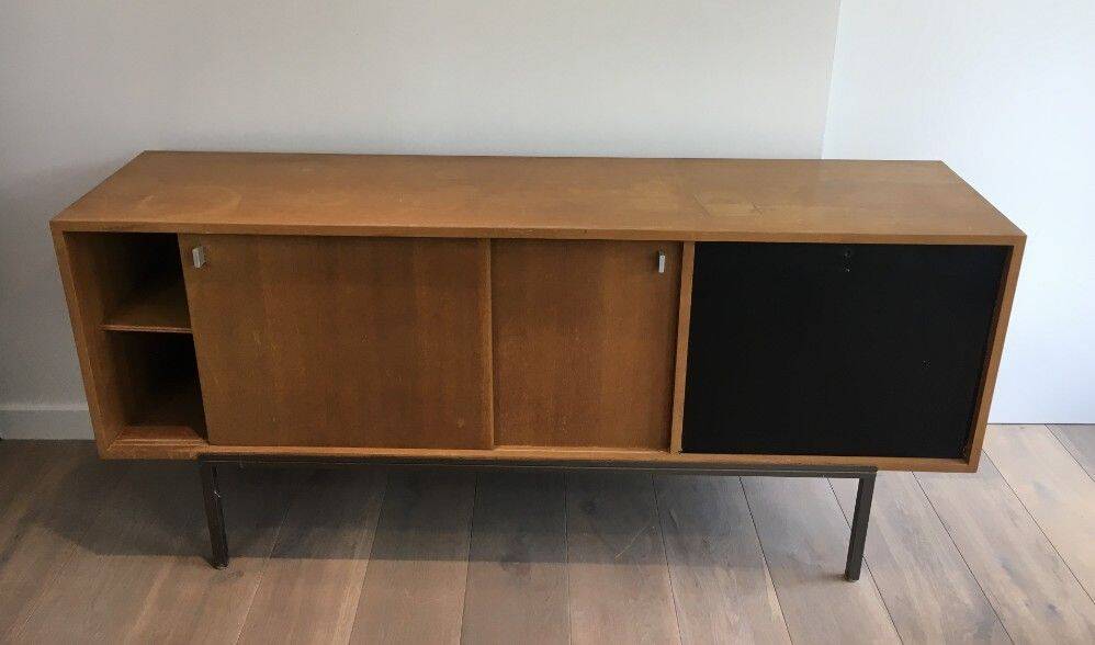 Sideboard with double sliding doors and bar on a metal base