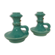 Pair of turquoise ceramic candlesticks