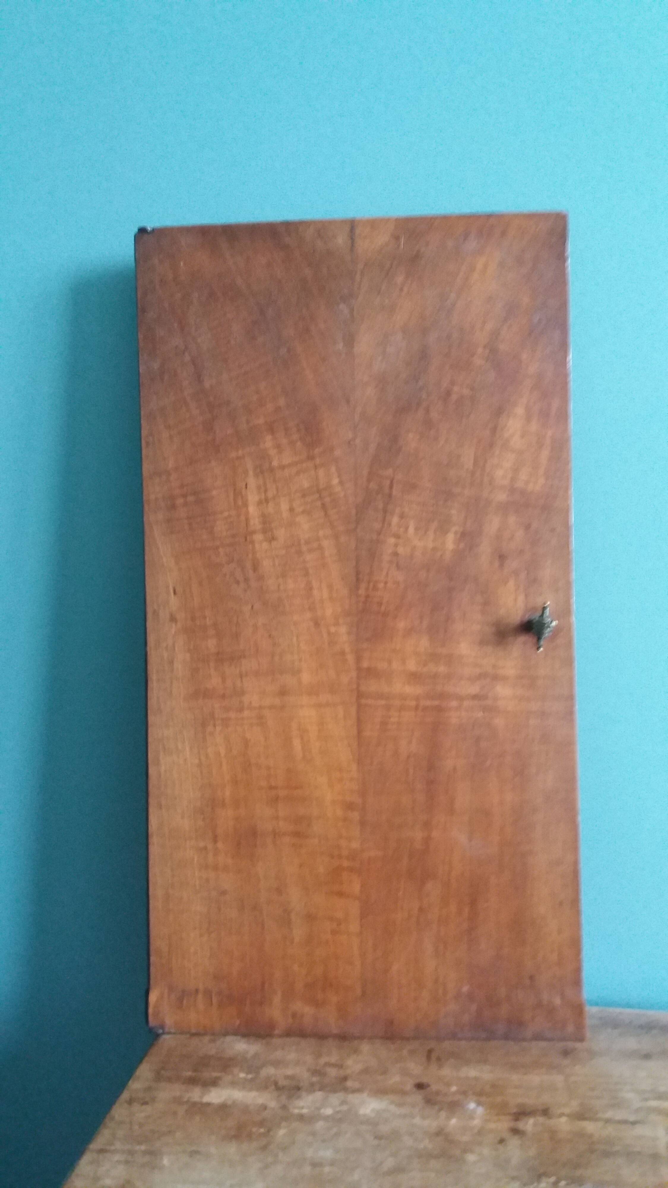 Old door with a bronze handle