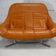 Sofa "space age". Leather, fiberglass, foam, steel. Circa 1970. Orange.