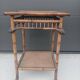 burnt bamboo side table and grass fabric