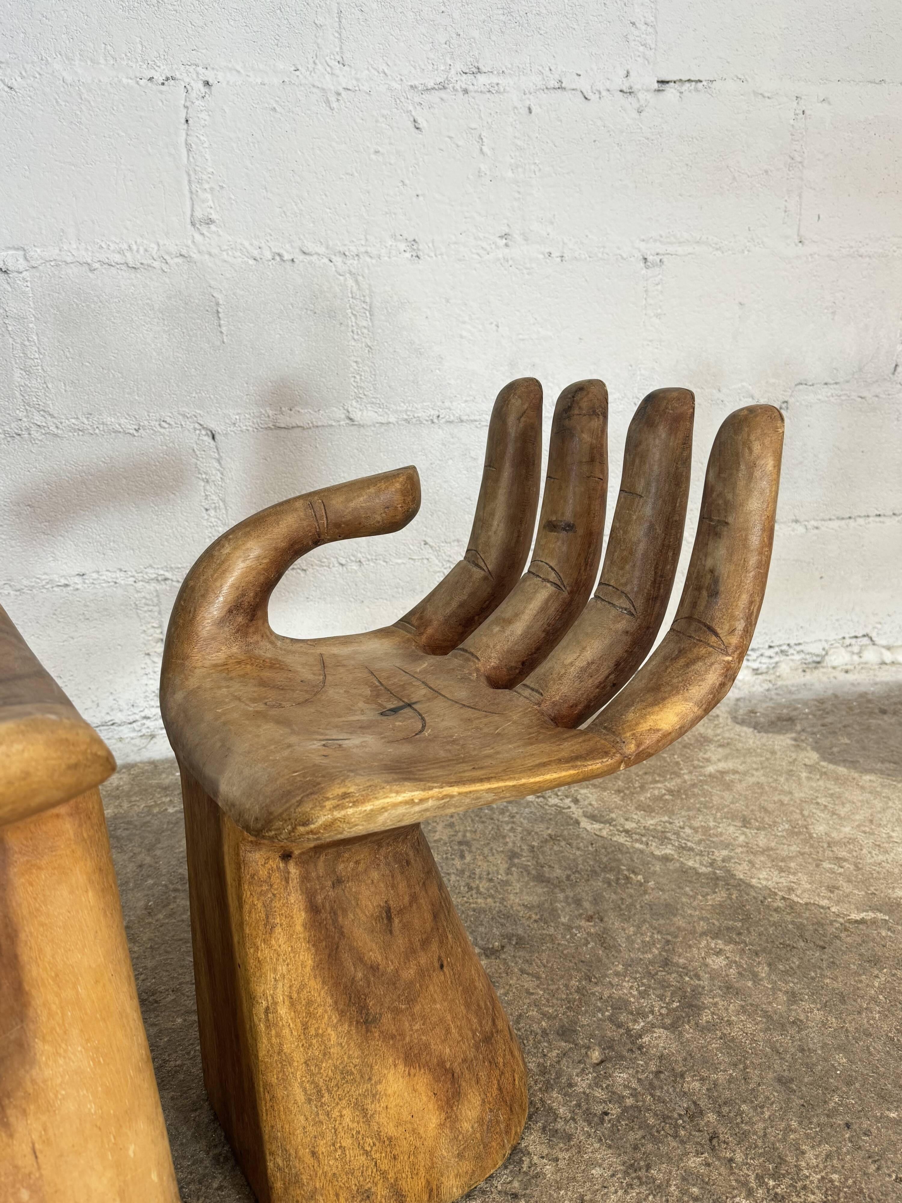 Hand carved chairs in the Pedro Fiedeberg style