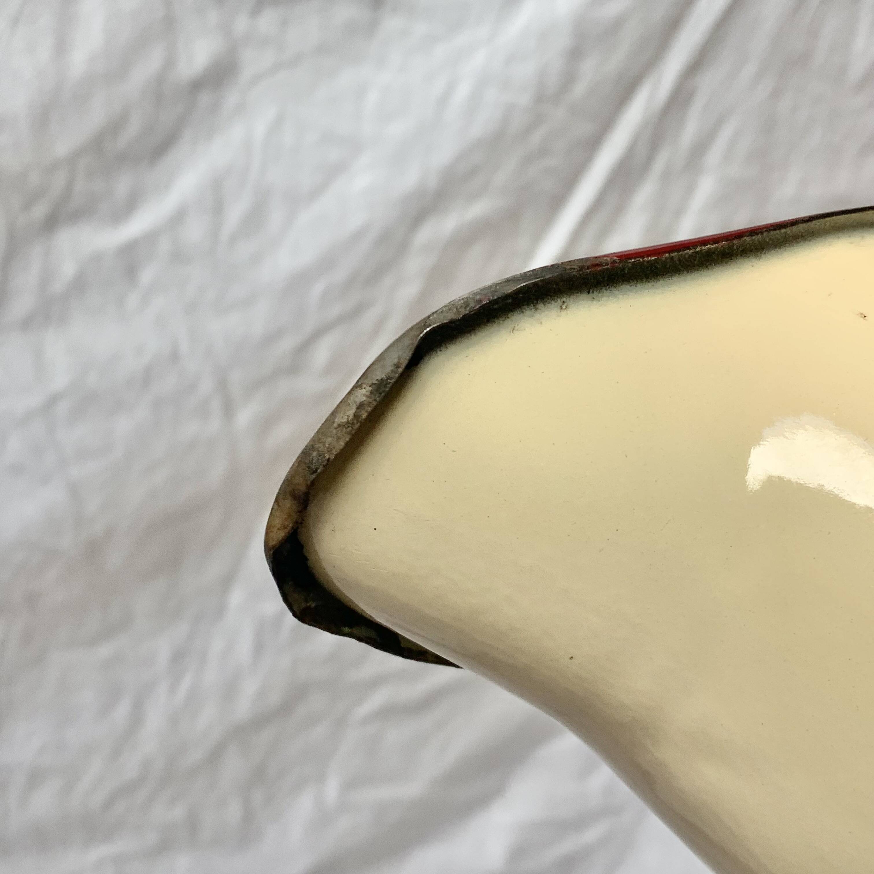 Vintage pitcher or jug in beige enamelled sheet metal