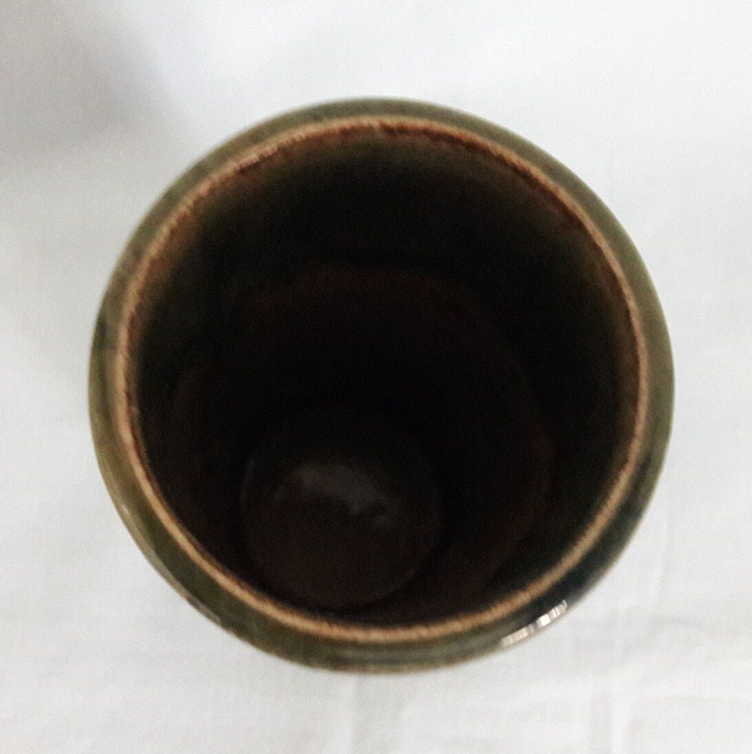Signed sandstone roll vase