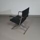 2 chaises pliantes en cuir chromé