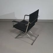 2 chaises pliantes en cuir chromé