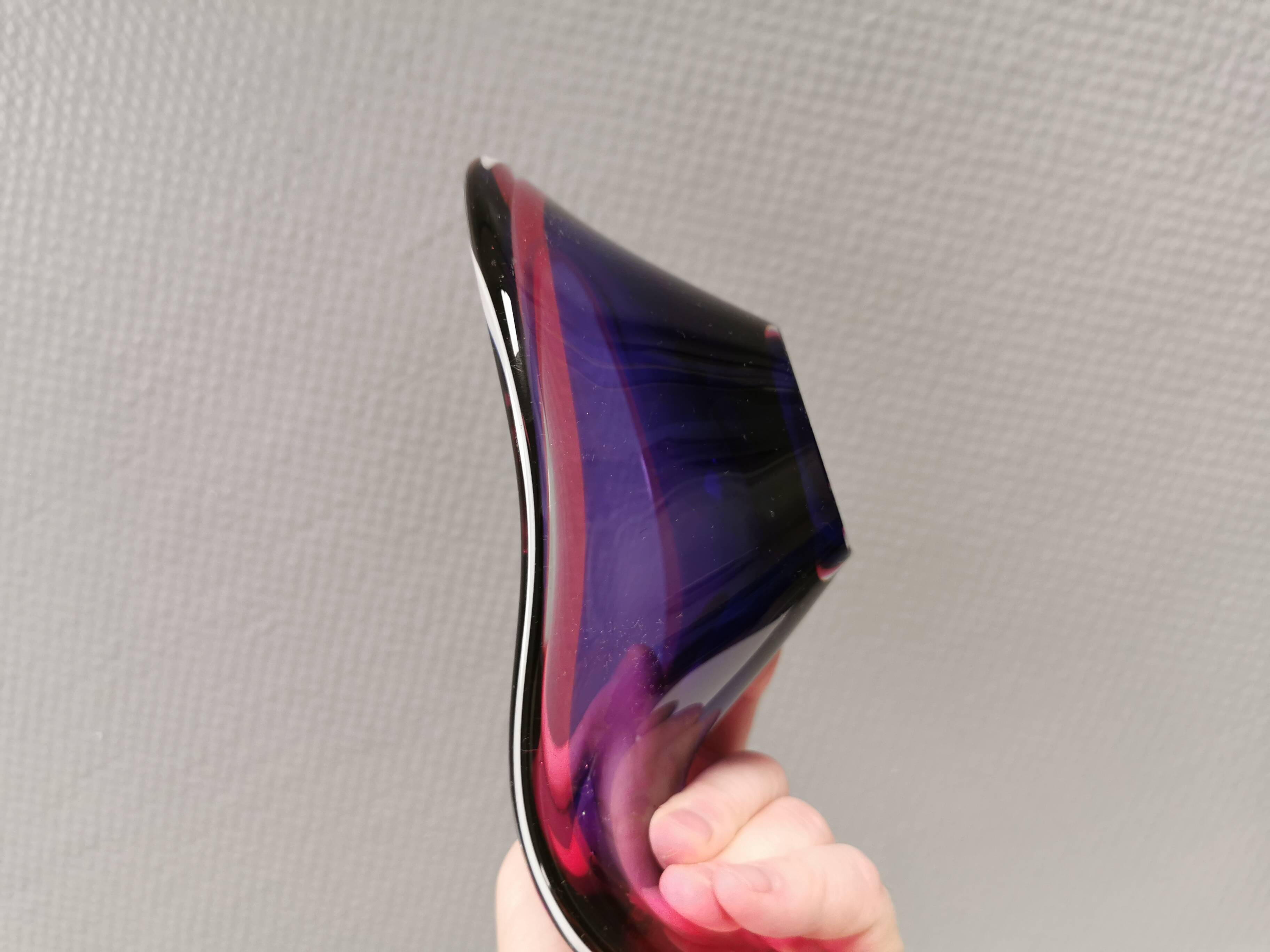 Beautiful dish/bowl in many coloured glass.