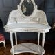 Coiffeuse du XIXe en bois peint et cannage de style Louis XVI