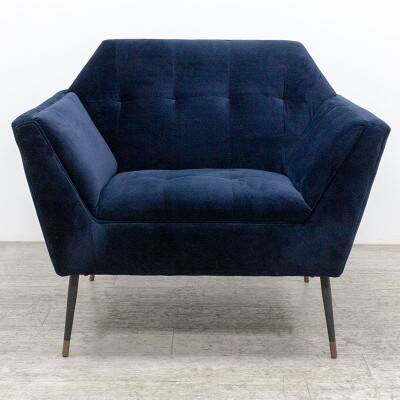 Fauteuil Dutchbone en velours bleu profond