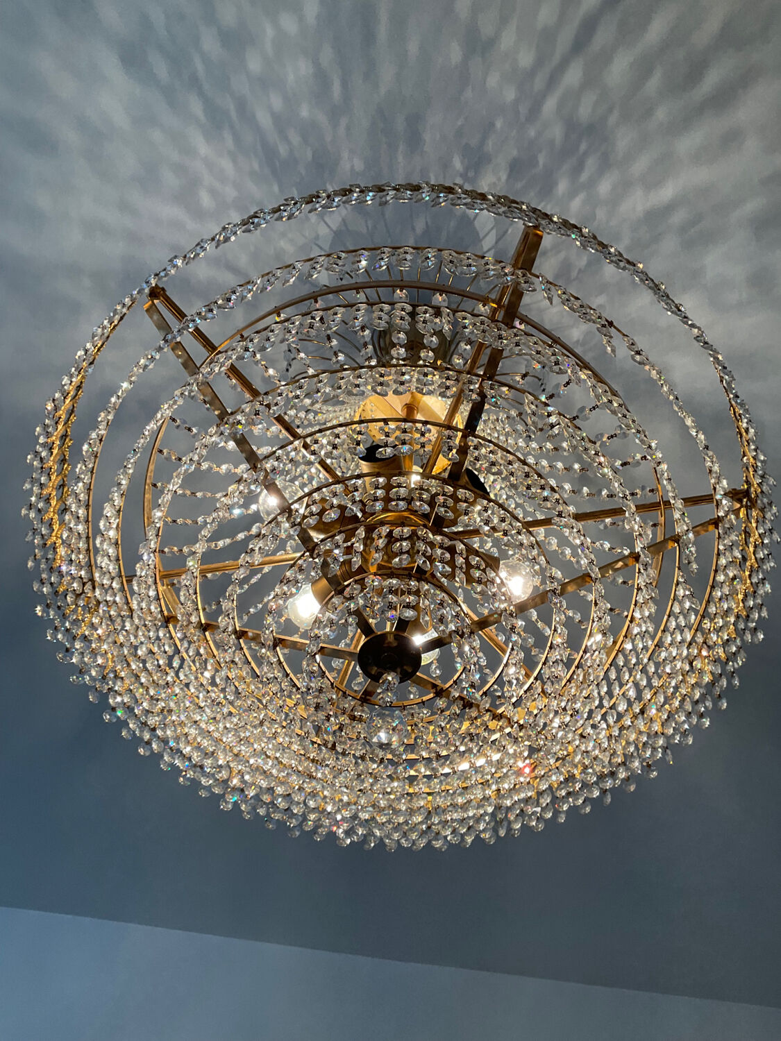 Brass chandelier and crystal tassel waterfall