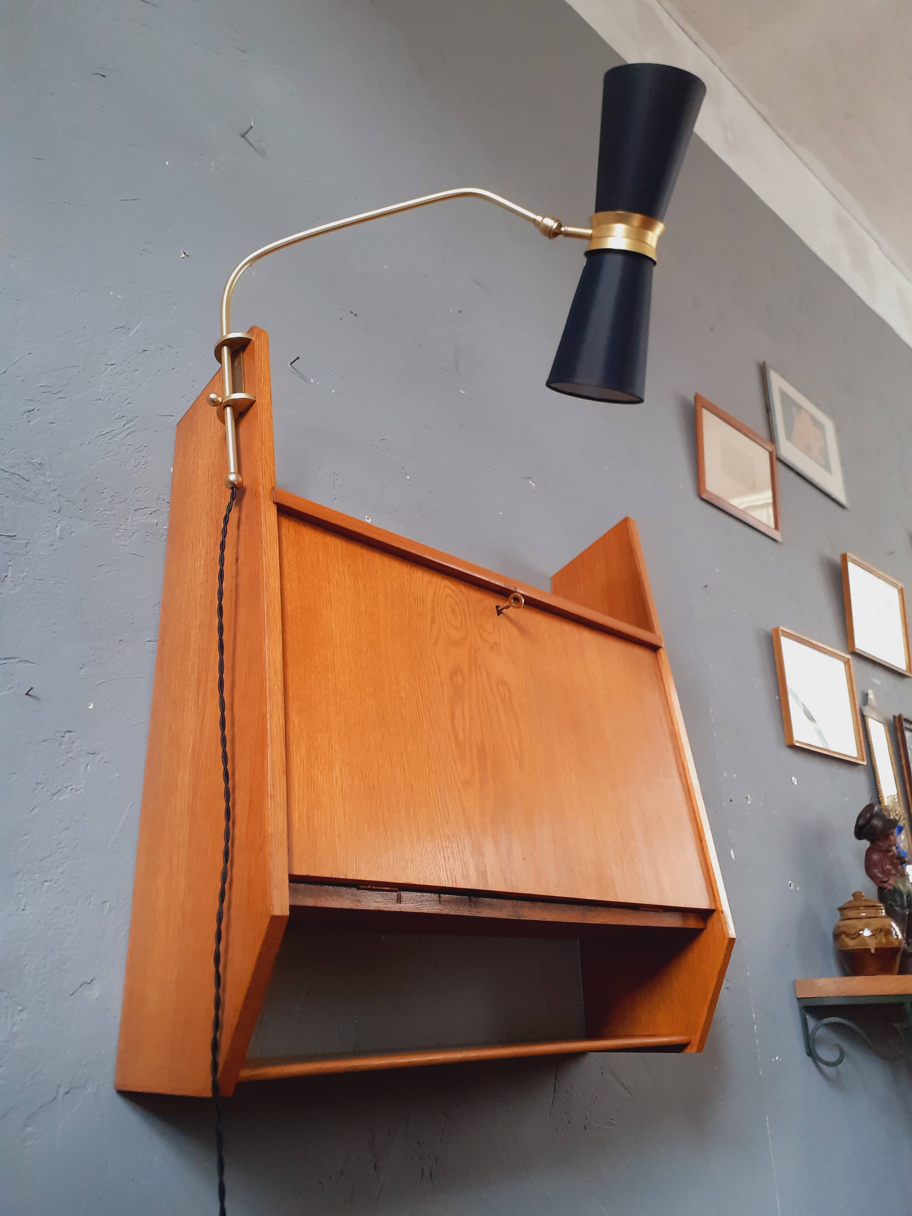Wall-mounted oak desk from the 1950s.