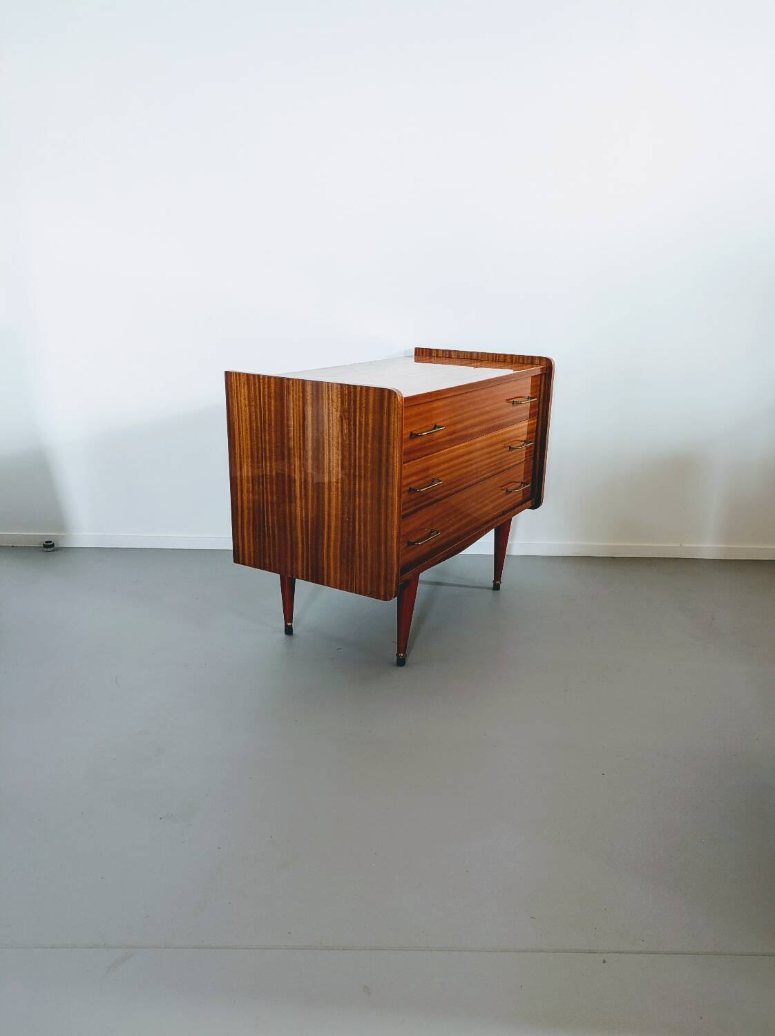 Vintage wooden chest of drawers in Scandinavian style