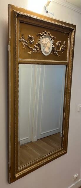 Antique gilded trumeau mirror in Louis XVI style